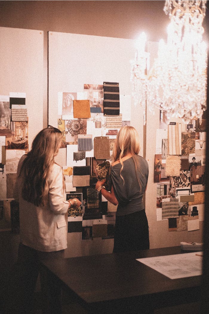 Artistic team collaborates in a Greenville design studio with a mood board.